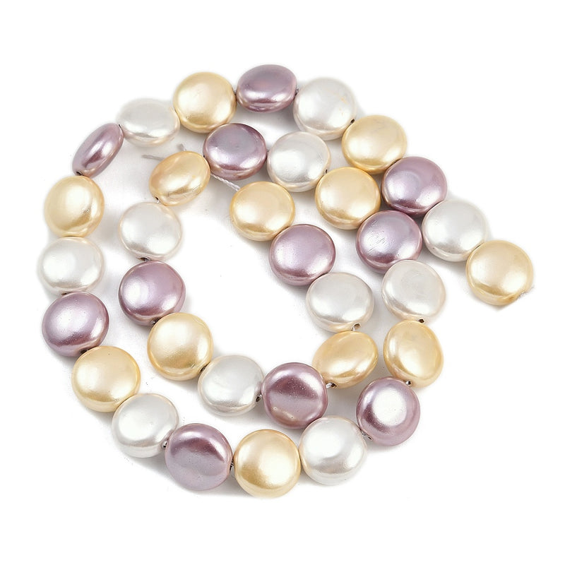 Snäckskalspärlor, platta, 1 sträng (13874)