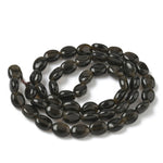 13921 Obsidian naturlig, oval, 8x6x3 mm, 1 sträng