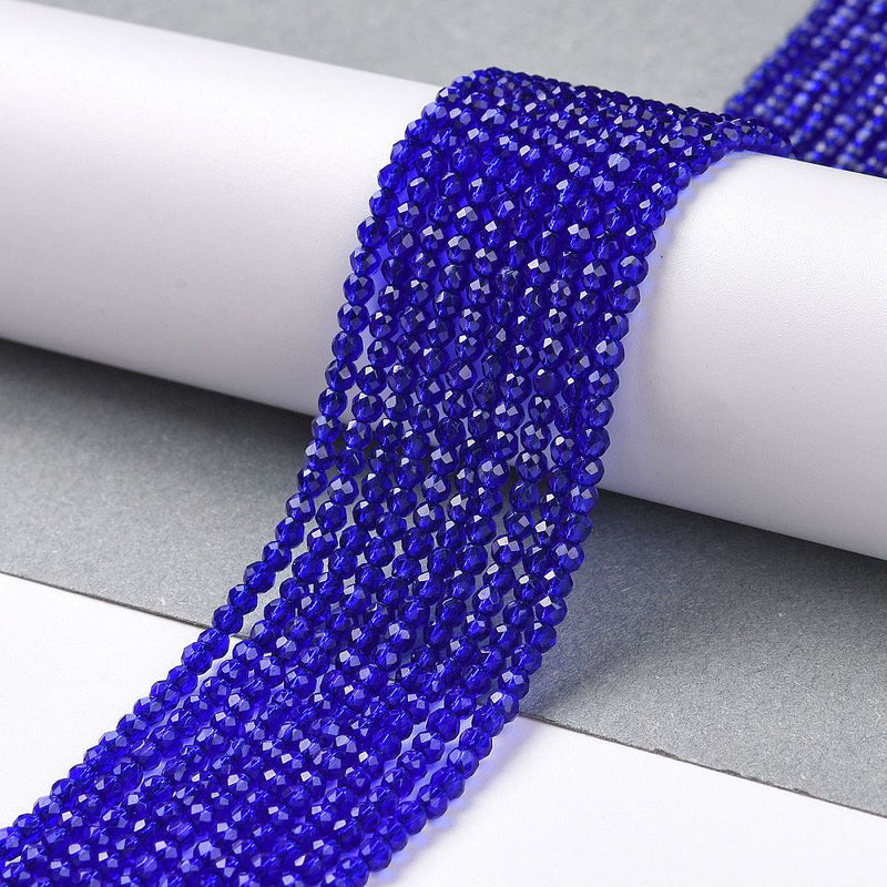 Glas pärla, facetterad, mörkblå, 2 mm, 1 sträng (14400)