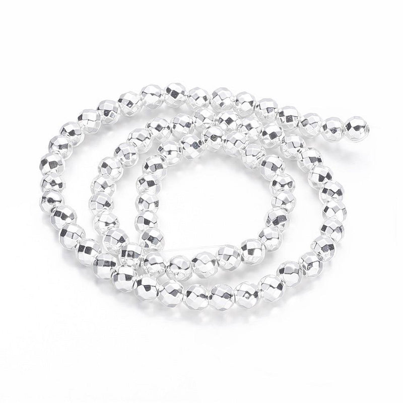 Hematit syntetisk facetterad rund 6 mm, Silver. 1 sträng (12816)