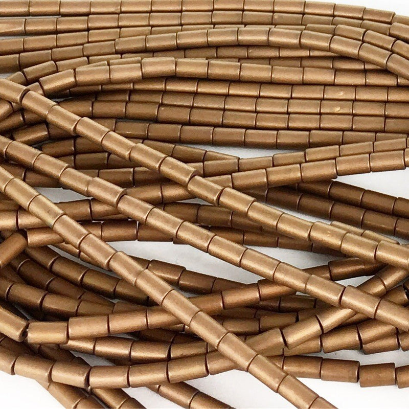 A055 Hematit cylinder 5x3 mm. Matt brun. 1 sträng