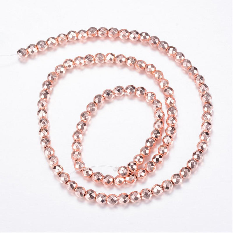 12187 Hematit facetterad rund 6 mm. Rosé. 1 sträng