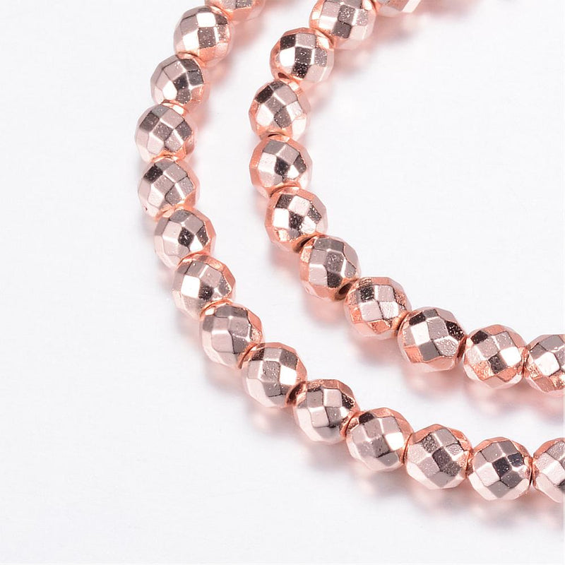 12187 Hematit facetterad rund 6 mm. Rosé. 1 sträng