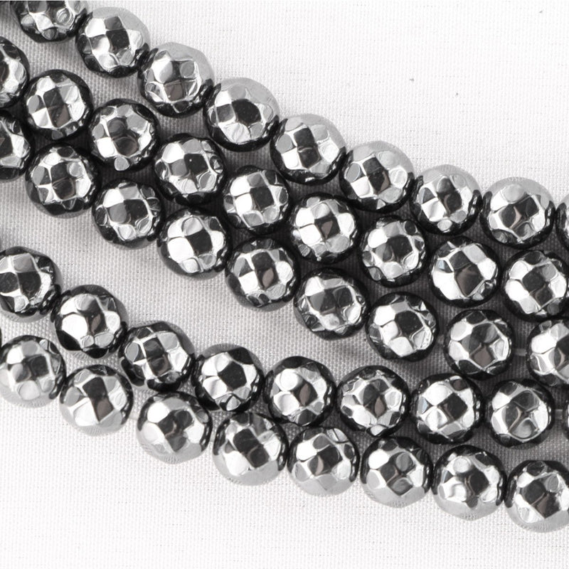 12817 Hematit 6 mm facetterad, 1 sträng ca. 69 pärlor