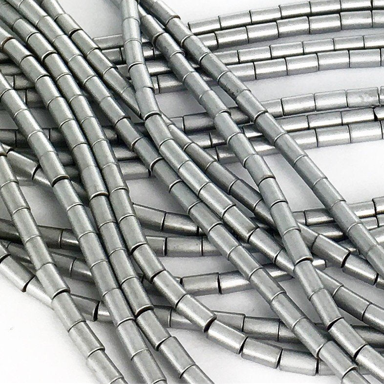 A051 Hematit cylinder 5x3 mm. Matt grå. 1 sträng